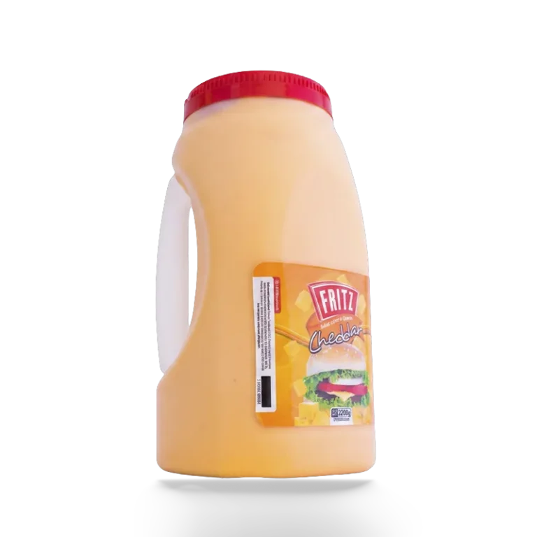Aderezo Sabor a Queso Cheddar Fritz 2200 g en pote con asa, recortado sobre fondo transparente